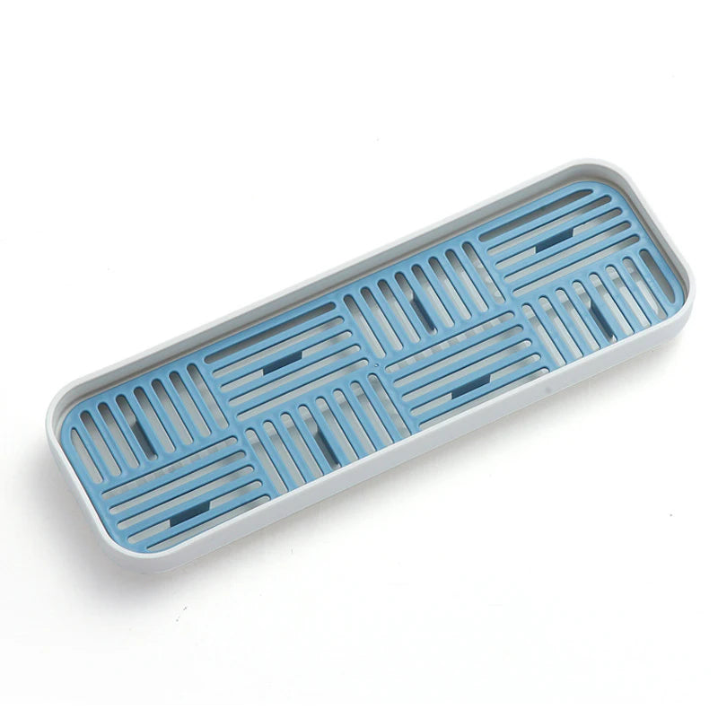 Petit égouttoir vaisselle plastique bleu sur fond blanc
