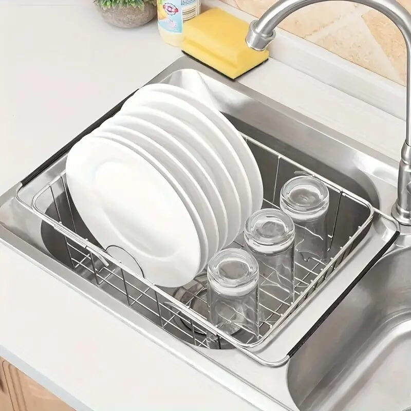 Égouttoir vaisselle rétractable inox avec assiettes et verres sur lavabo double