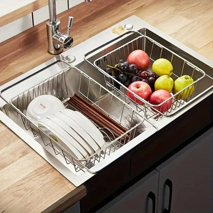 Deux égouttoirs vaisselle rétractables inox sur lavabo double